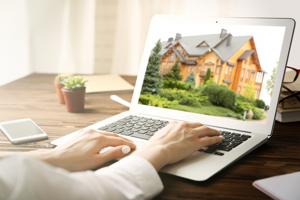 Woman looking at her dreamhouse