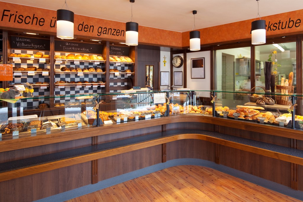 Modern bakery interior with glass display counters