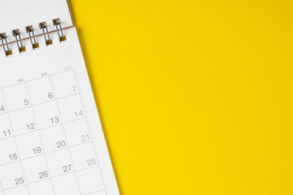 calendar in top of a yellow table