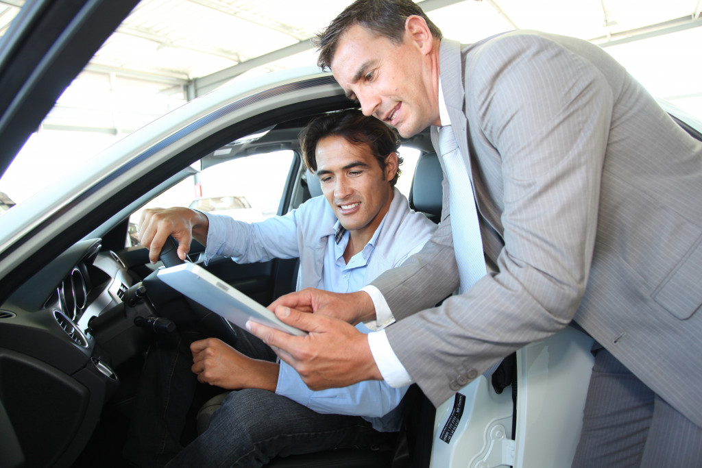 car rental employee and customer
