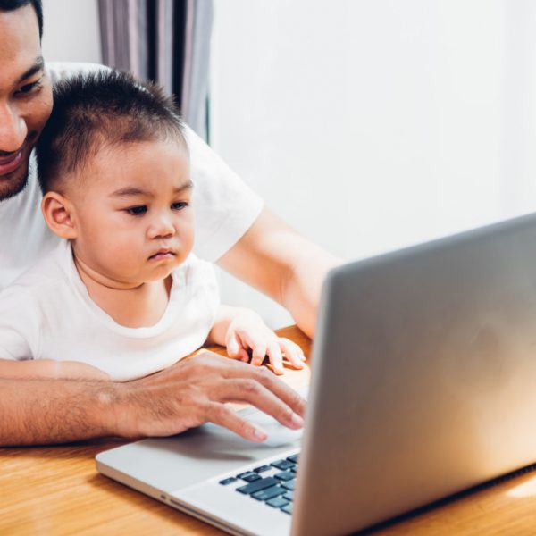 father working with his young son