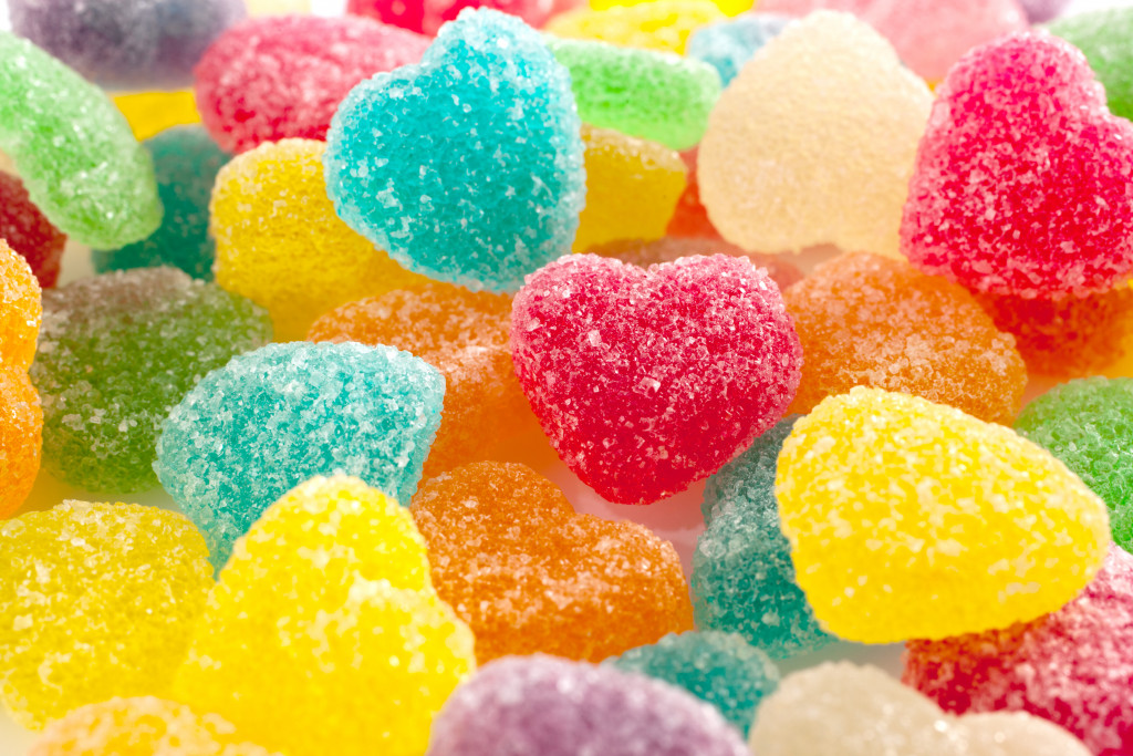 Colorful heart-shaped candies covered in sugar
